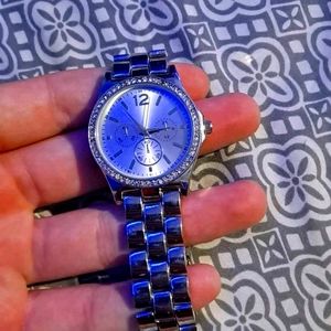 Shoes watches and earrings